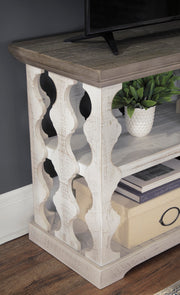 Ashley Furniture Havalance sofa table, console style with sleek wood finish and modern design, shown in detailed image.