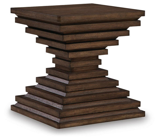 Ashley Furniture Hannodream End Table with wood finish and tapered legs, shown from an angled side view.