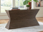 Ashley Furniture Hannodream sofa table with a modern wooden design, featuring a smooth surface and sturdy legs.