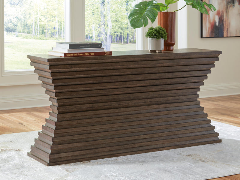 Ashley Furniture Hannodream sofa table with a modern wooden design, featuring a smooth surface and sturdy legs.