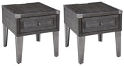 Ashley Furniture Todoe end table set featuring modern wooden tables with sleek design and natural wood finish.