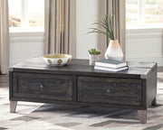 Ashley Furniture Todoe occasional table set with two modern tables featuring sleek wooden tops and metal legs.