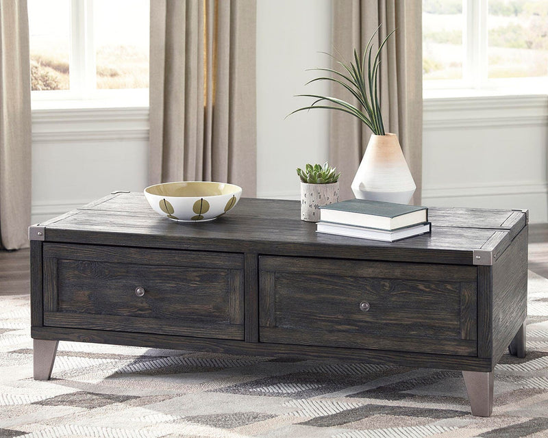Ashley Furniture Todoe table set with a rectangular wooden table and matching chairs, showcasing a modern dining room arrangement.