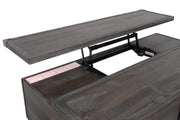 Ashley Furniture Todoe Occasional Table Set with three modern, round tables featuring wood and metal finishes.