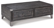 Ashley Furniture Todoe Occasional Table Set with two modern tables featuring sleek wood finishes and minimalist design.