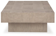 Ashley Furniture Jorlaina occasional table set showing two side tables with wooden tops and metal legs, modern design.
