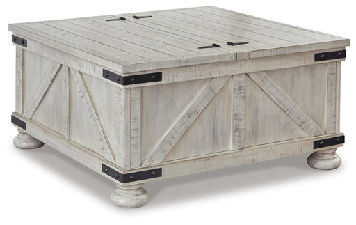 Ashley Furniture Carynhurst coffee table with a sleek wooden finish, shown from an angled view highlighting its modern design.