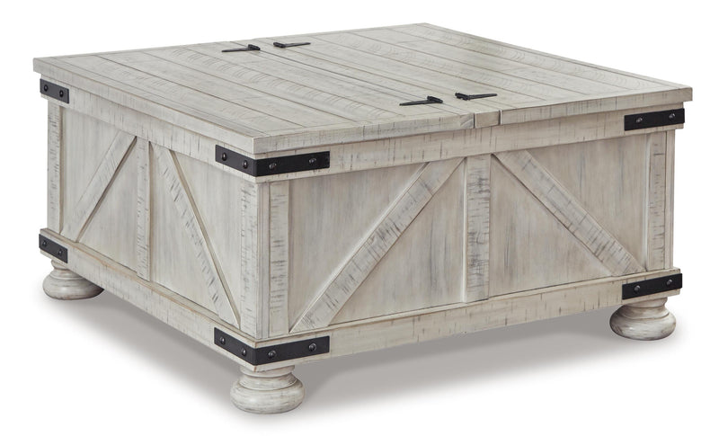 Ashley Furniture Carynhurst occasional table set with three wooden tables, shown from an angled view with closed storage compartments.