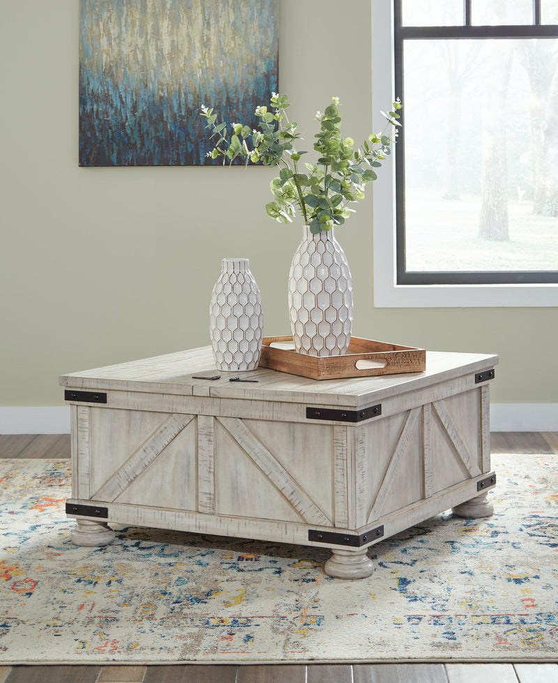Ashley Furniture Carynhurst Occasional Table Set featuring two elegant wood tables with a polished finish and classic design.