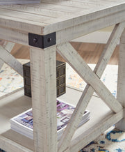 Close-up of the Carynhurst End Table by Ashley Furniture, showcasing its detailed wood grain and elegant design features.