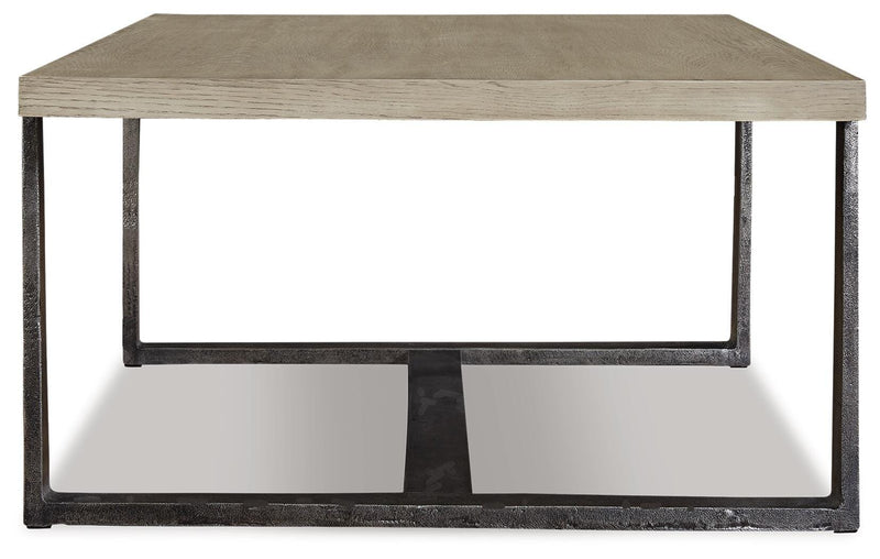 Ashley Furniture Dalenville coffee table with a sleek wooden top and modern design, shown in a stylish living room setting.