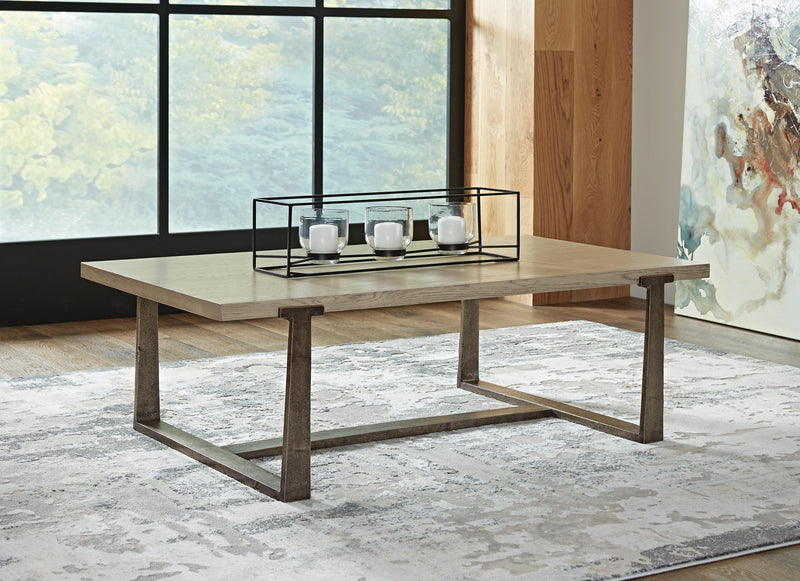 Ashley Furniture Dalenville coffee cocktail table with a wooden top and metal legs, designed for stylish living room decor.