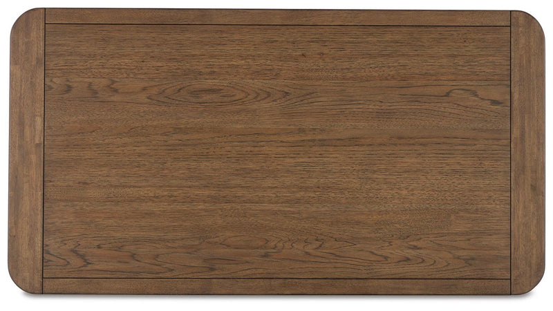 Ashley Furniture Cabalynn coffee table with a sleek wooden top and modern design, perfect for living room decor.
