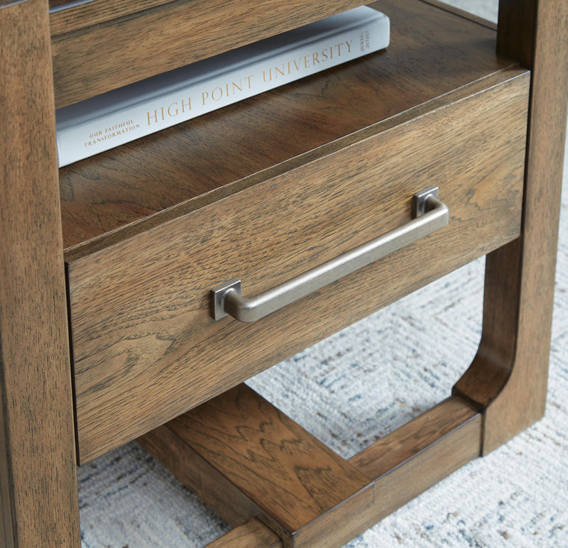Ashley Furniture Cabalynn occasional table set with two modern wood tables featuring sleek tabletops and sturdy bases.