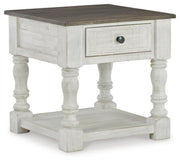 Ashley Furniture Havalance end table with angled design and closed storage, featuring a sleek wood finish.