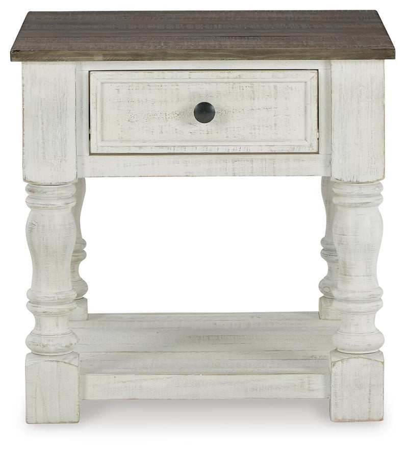 Ashley Furniture Havalance end table with wood finish and modern design, shown from a head-on perspective.