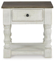 Ashley Furniture Havalance occasional table set featuring two modern tables with sleek wood finishes and contemporary design.