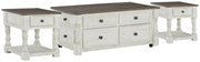 Ashley Furniture Havalance occasional table set with two sleek wooden tables featuring modern design and warm finish.