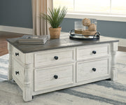 Ashley Furniture Havalance occasional table set with two wooden tables featuring sleek metal legs and a modern design.
