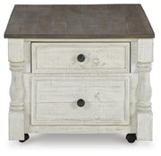 Ashley Furniture Havalance lift-top cocktail coffee table with storage, featuring a modern design and a dark wood finish.