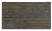 Ashley Furniture Havalance lift-top coffee table with a sleek wooden surface and hidden storage in a modern living room setting.