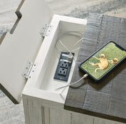 Ashley Furniture Havalance chairside end table with storage drawer and open shelf in a modern wood finish.