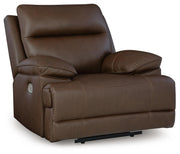 Ashley Furniture VonRyan power recliner in dark fabric, shown from a side angle in a closed position