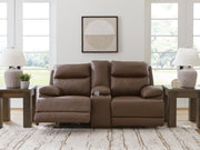 Ashley Furniture VonRyan Power Reclining Loveseat, plush fabric, padded armrests, and built-in recline mechanism for comfort.