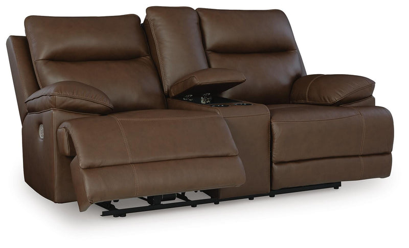 Ashley Furniture VonRyan power reclining loveseat shown from an angled open view, featuring plush cushions and reclining mechanism.
