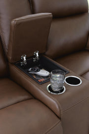 Close-up of the Ashley Furniture VonRyan Power Reclining Loveseat with built-in console and plush cushioning.