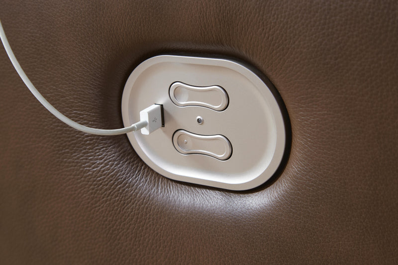 Ashley Furniture VonRyan Power Reclining Loveseat with USB ports, shown in a close-up highlighting the reclining and USB features.