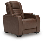 Ashley Furniture high impact power recliner shown from an angle, featuring plush cushioning and a sleek design for comfortable seating.