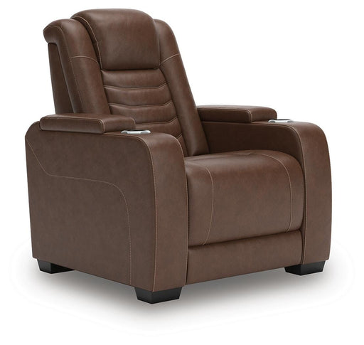Ashley Furniture high impact power recliner shown from an angle, featuring plush cushioning and a sleek design for comfortable seating.