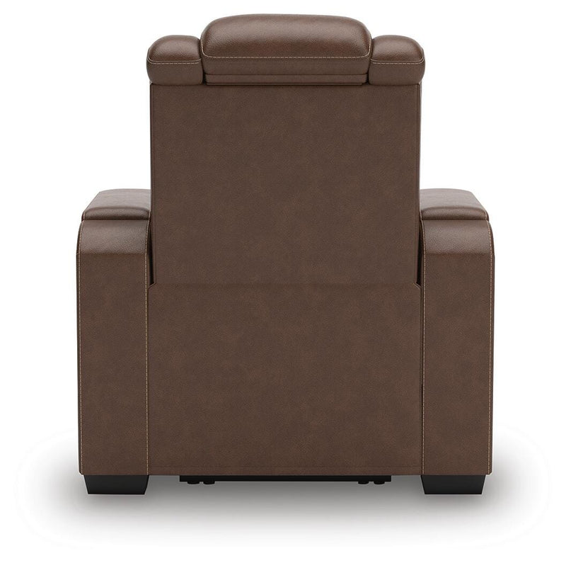 Ashley Furniture high impact power recliner with plush backrest and padded armrests, showcasing its comfortable design.