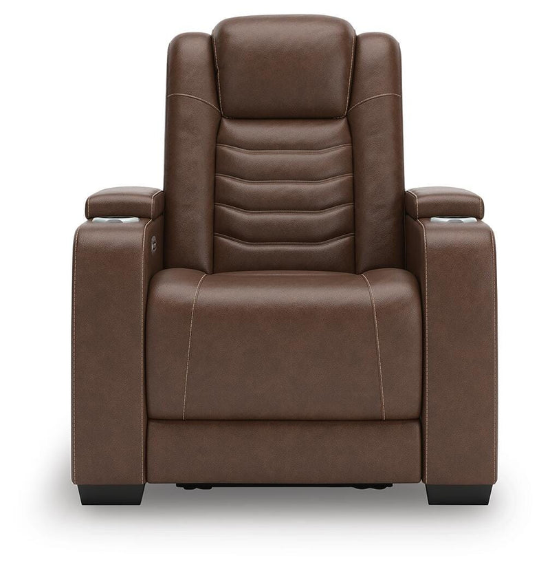 Ashley Furniture high impact power recliner with plush upholstery and padded armrests, shown from a head-on perspective.