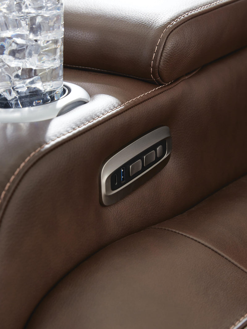 Ashley Furniture high impact power recliner with control, featuring plush cushioning and modern design for comfortable relaxation.