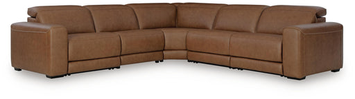 Ashley Furniture Magic Man 5-Piece power reclining sectional showing plush cushions and reclining seats in a modern living room setting.