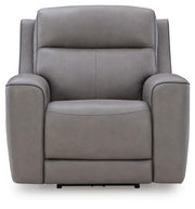 Ashley Furniture 5Z-Comfort Power Recliner showcasing plush upholstery and built-in recline mechanism from a head-on view.
