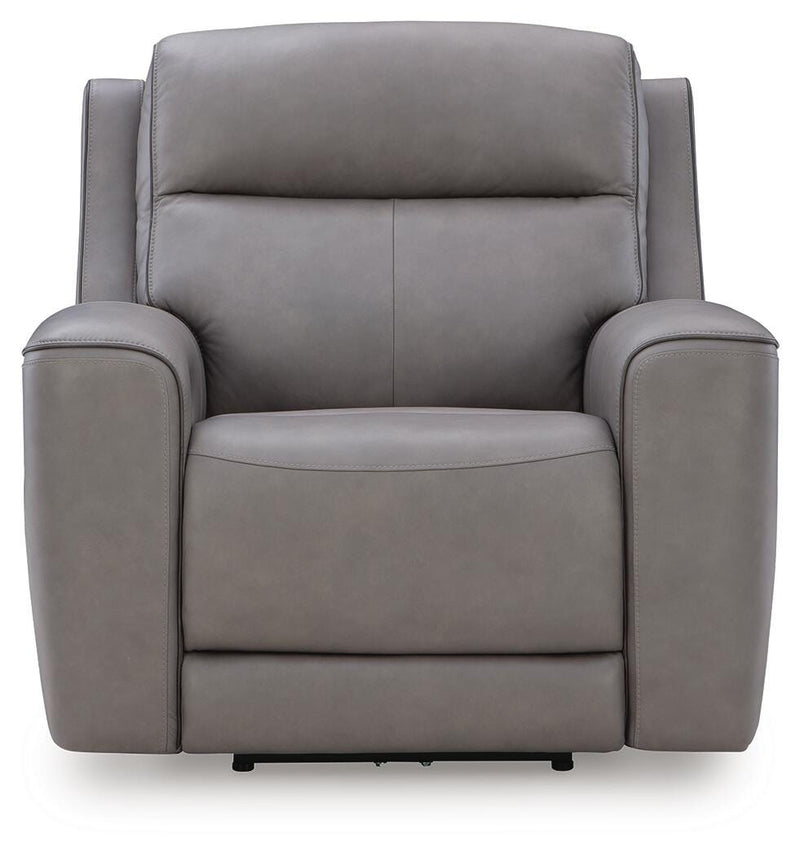 Ashley Furniture 5Z-Comfort Power Recliner showcasing plush upholstery and built-in recline mechanism from a head-on view.