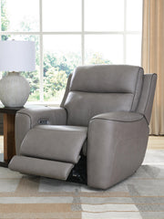 Ashley Furniture 5Z-Comfort Power Recliner in open position, showcasing plush fabric upholstery and padded armrests.