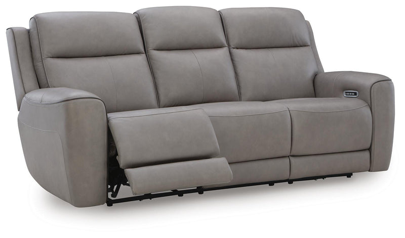 Ashley Furniture 5Z-Comfort Power Reclining Sofa shown from an open angle, featuring plush cushions and reclining mechanism.
