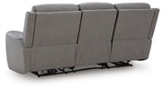 Ashley Furniture 5Z-Comfort Power Reclining Sofa showing plush back cushions and reclining features in a modern living room setting.