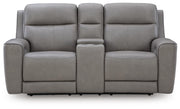 Ashley Furniture 5Z-Comfort power reclining loveseat with console, showing plush fabric, integrated cup holders, and reclining features.