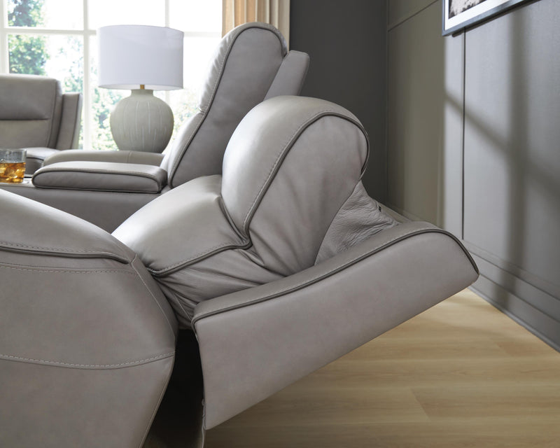 Ashley Furniture 5Z-Comfort living room set with plush sofa and matching armchair, featuring neutral upholstery and modern design.