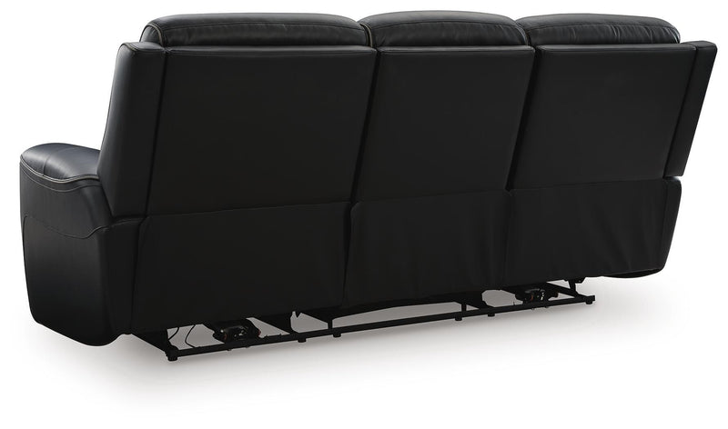 Ashley Furniture 5Z-Comfort Power Reclining Sofa showing plush upholstery and reclining features in a modern living room setting.