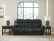 Ashley Furniture 5Z-Comfort Power Reclining Sofa showing plush cushions and reclining mechanism in a modern living room setting.
