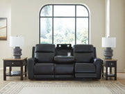Open Ashley Furniture 5Z-Comfort Power Reclining Sofa showing plush cushions and reclining mechanism in a modern living room setting.