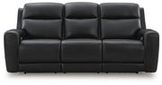Ashley Furniture 5Z-Comfort Power Reclining Sofa with plush cushions and modern design, shown from a front head-on view.