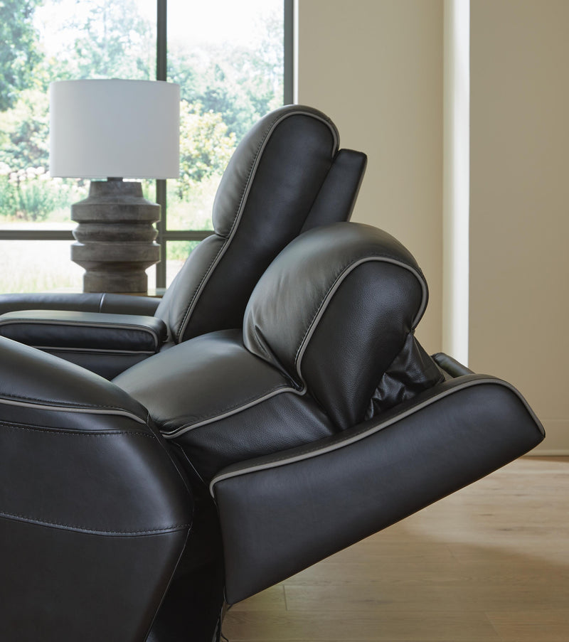 Ashley Furniture 5Z-Comfort Power Reclining Living Room Set with plush cushions and reclining seats in a cozy living room setting.