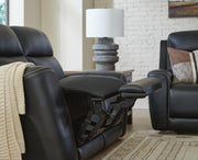 Ashley Furniture 5Z-Relaxation Power Reclining Sofa showing soft upholstery, plush cushions, and reclining features.
